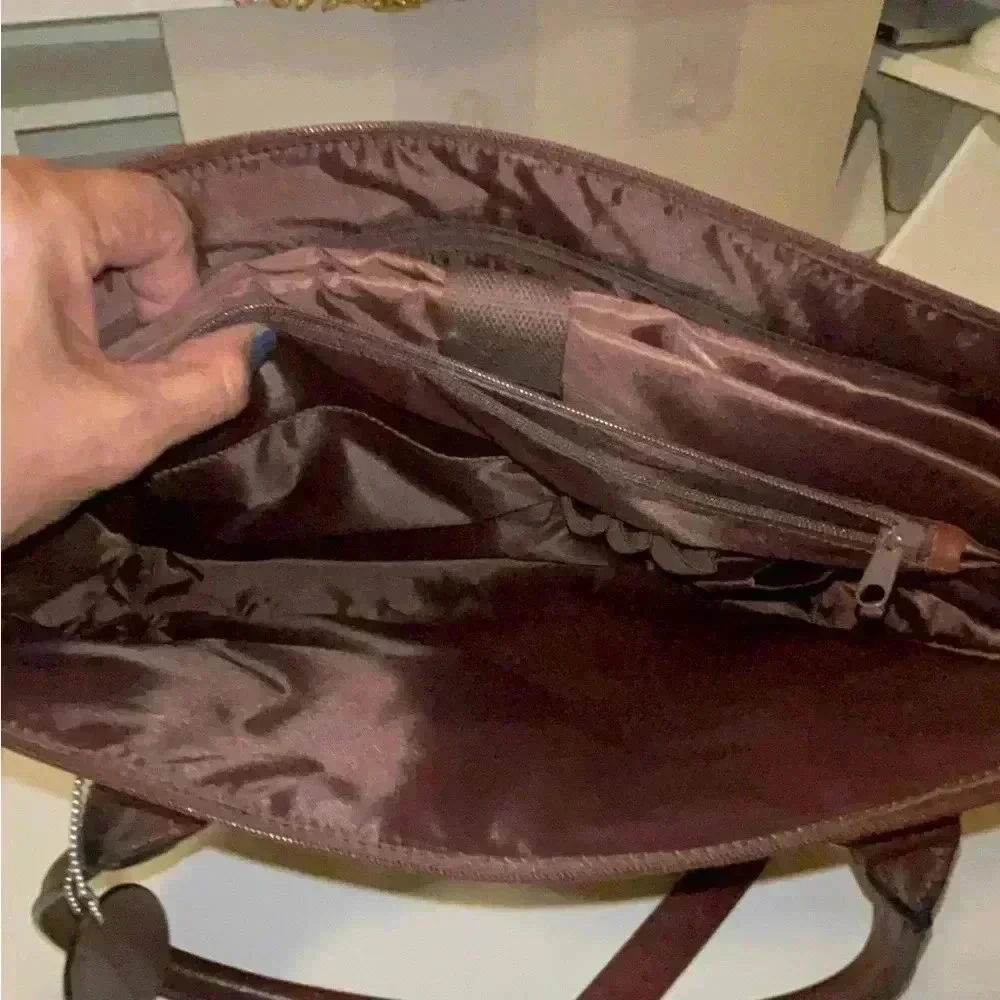 Wilson leather original back, rown color great conditions with adjstbel strap